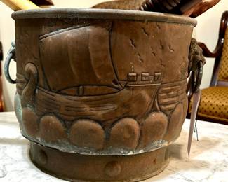 Large copper log bucket, England, circa 1880s. Lions head handles. Hand hammered Viking ships, deep collared base.