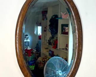 Oval bevel edge mirror