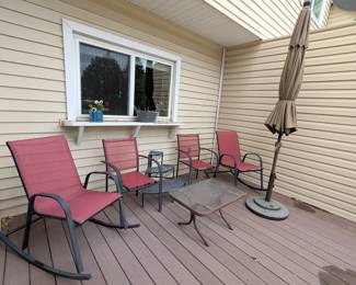 Patio furniture, 2 rocking chairs, 2 straight back chairs, 1 plant stand, 1 glass top table, umbrella with stand