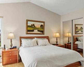 Art above bed is NOT available. Modern Danish Style King size bed and Mattress, Matching side tables and lamps.