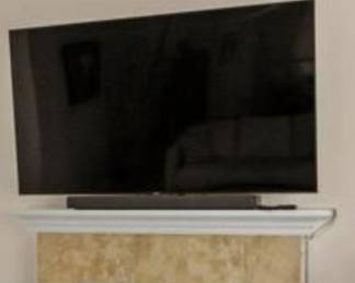 Flat screen TV and Sound bar