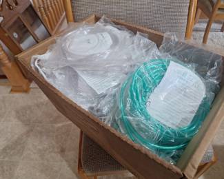 20 and 50 feet lengths of new oxygen tubing and 30 new cannula's, plus a 3rd battery.