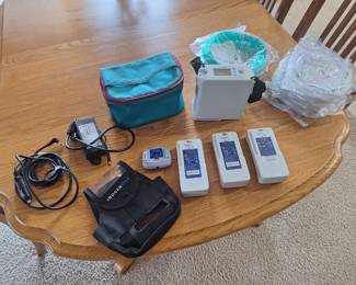 INOGENONE Portable Oxygen Concentrator with case, one extra battery, new hose and new cannula.