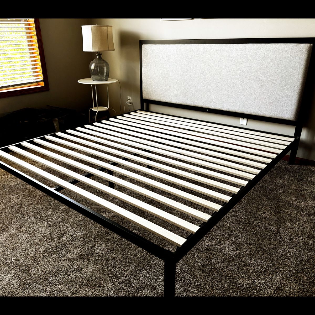 King-size platform bed with headboard