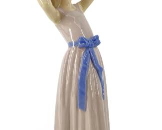 Lladro Porcelain ‘Trying on a Straw Hat' Sculpture