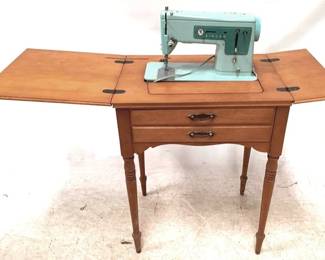 153 - Singer Sewing Machine & Stand 19x24x31 You are buying a used as-is electric/electronic item. We do not guarantee all components are present, and if it is not expressly stated, it is untested.