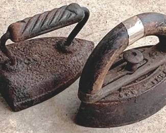 559 - 2 Antique Irons - 7" Long