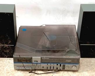 144 - Emerson Record Player Shelf Hero & 2 Speakers You are buying a used as-is electric/electronic item. We do not guarantee all components are present, and if it is not expressly stated, it is untested.