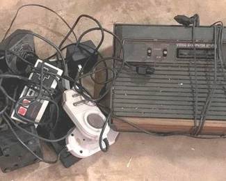 1018 - Atari VIdeo Game System with Controllers You are buying a used as-is electric/electronic item. We do not guarantee all components are present, and if it is not expressly stated, it is untested.