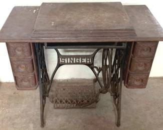 1034 - Singer Sewing Machine - 32" x 36" x 18" You are buying a used as-is electric/electronic item. We do not guarantee all components are present, and if it is not expressly stated, it is untested.
