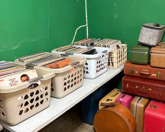 Some of the 1000s of records at this sale, vintage luggage