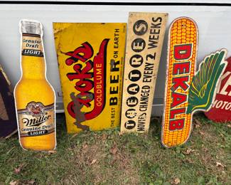 Miller genuine draft light metal sign
Cooks gold bloom the best beer on earth sign
Theaters movies change every two weeks sign
DeKalb corn sign