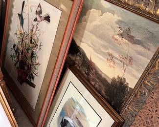 hundreds of pieces of framed art throughout the warehouse, all sizes and styles
