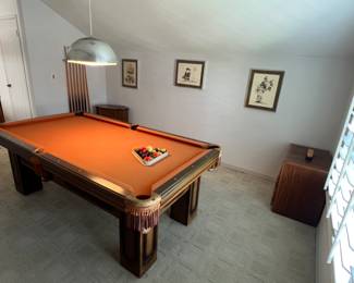 A vintage pool table, if you can move it it's very inexpensive....