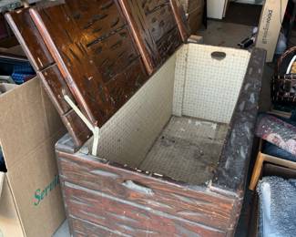 This trunk is very cool! Obviously an old one with vintage wall paper inside this is only $50.00 !
