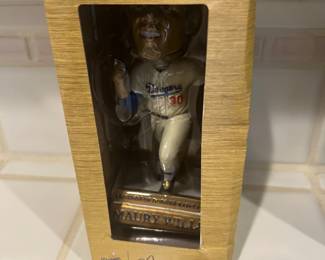 several Dodger bobble heads...