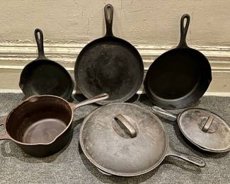 8 Vintage Cast Iron Pans, Some With Lids By Lodge, Wagner & More
Lot #: 102