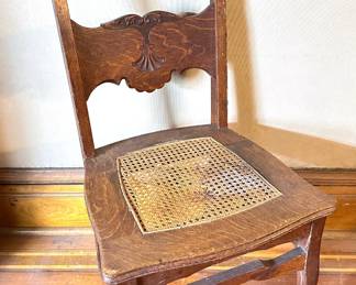 Antique Solid Wood Carved Dining Room Chair With Caned Seat
Lot #: 110