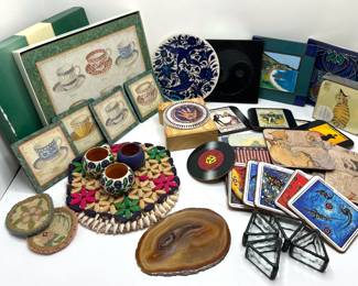 Placemats, Trivets, Coasters & Napkin Rings Including Several Sets (Over 40 Pieces)
Lot #: 158
