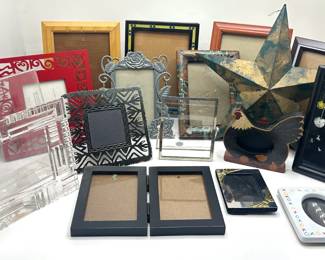 16 Picture Frames & Metal Star
Lot #: 184