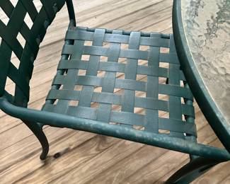 R36 - $75 - Patio Set with Glass Top Table and 4 Chairs. Surface rust.