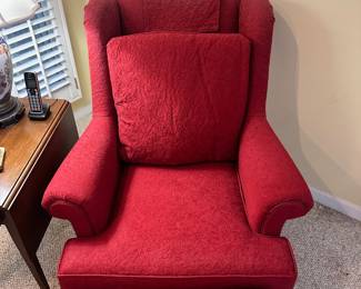 R27 - $125 - Red upholstered chair with claw feet from a pet and smoke free home. In good condition.
