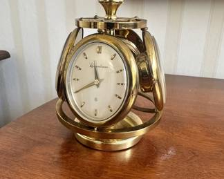 R30 - $250 - Rare 1950s Remembrance Swiss Brass Weather Station Desk Clock. Serves as a thermometer, barometer, and hygrometer. Sits about 5"tall.