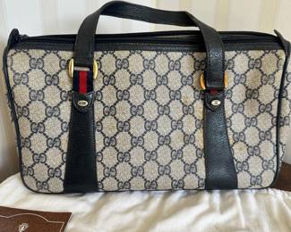 R87 - $300- Vintage GG Supreme Top Handle Bag. See photos for acknowledged stain / wear. Easy to clean.