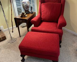 R27 - $125 - Red upholstered chair with claw feet from a pet and smoke free home. In good condition.