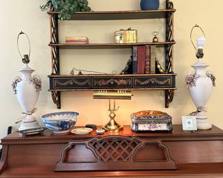 R48 - $150 - Chelsea House Black Lacquer and Gold hanging shelves . Measures 35" wide x 8" deep x 31.5" tall.