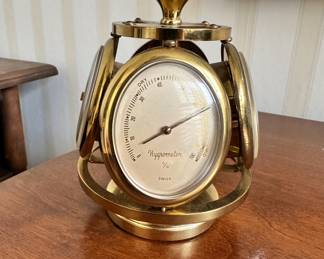 R30 - $250 - Rare 1950s Remembrance Swiss Brass Weather Station Desk Clock. Serves as a thermometer, barometer, and hygrometer. Sits about 5"tall.
