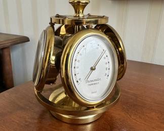 R30 - $250 - Rare 1950s Remembrance Swiss Brass Weather Station Desk Clock. Serves as a thermometer, barometer, and hygrometer. Sits about 5"tall.