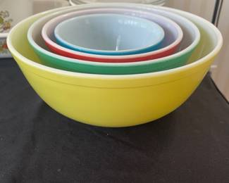 R2 - $100 - PYREX Nesting Bowls. 4 piece set. Still vibrant with so much life left to live! (A few minor scratches here and there.)