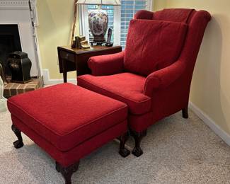 R27 - $125 - Red upholstered chair with claw feet from a pet and smoke free home. In good condition.