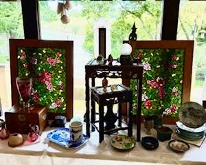 Amazing stained glass floral windows, Asian wood nesting tables, ruby cut glass, and Zhang Song Mao "The Marble Boat" collector plates