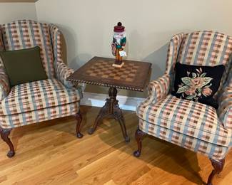Pair of matching wing back chairs and game table
