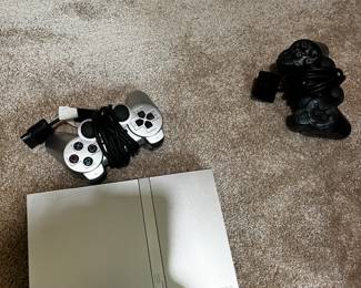 #101 PlayStation 2 Silver Slim w/power cord and 2 controllers $45.00