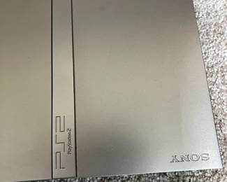 #101 PlayStation 2 Silver Slim w/power cord and 2 controllers $45.00
