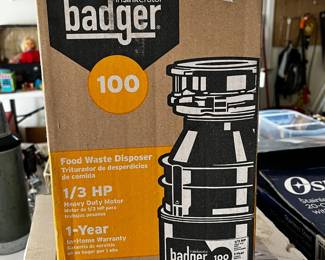 #123 Badger 100 Garbage Disposal - In Box $35.00