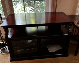 #27 TV stand with 2 glass doors, 1 shelf 43x22x27 $125.00
