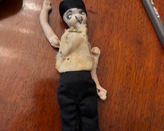 Antique composition and hand painted doll with string joints