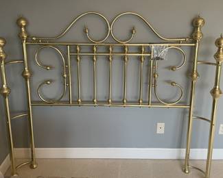 Brass headboard.