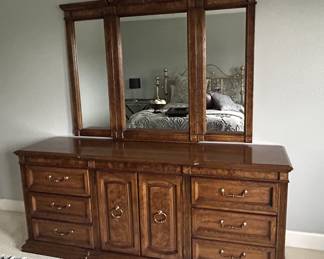 Large solid wood dresser with matching mirror and night stand.