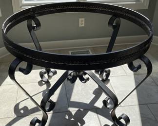 Wrought iron table base. Very solid can hold up to 150 lb stone table top.
