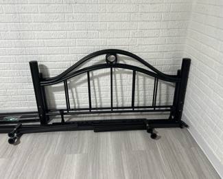 Black metal headboard no frame.