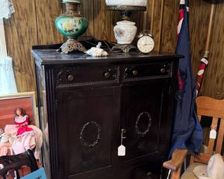 Gentleman dresser, drawers behind doors, flags, and GWTW lamps, oak rocker, blond cedar chest