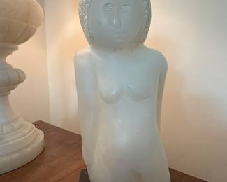 Alabaster Sculpture of Stylized Female Figure This piece is reminiscent of the work of artists such as Henry Moore or Constantin Brâncuși, known for their simplified, organic forms.