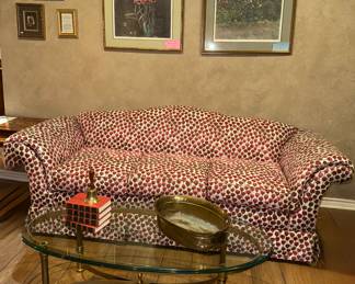 Sofa with red roses - (or is it chocolate dipped strawberries ????)
MCM Brass & glass coffee table