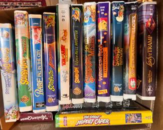 Many VHS tapes of Disney and kids animated films