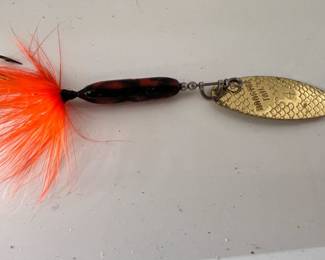 Collection of vintage fishing lures and tackles